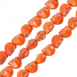 Passante di Howlite Teschio 3D 9.5x12mm (~34pz/filo)