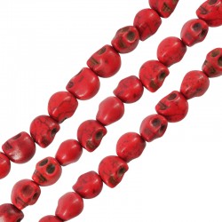 Passante di Howlite Teschio 3D 9.5x12mm (~34pz/filo)