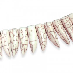 Ciondolo in Howlite Dente 10x30mm (~39pz/filo)