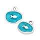 Breloque ovale en zamac avec poisson et émail 13x10mm