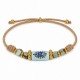 Bracelet avec Tube Coulissant en Céramique Bleu Clair et Œil Maléfique