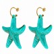 Boucles d'oreilles créoles d'été avec étoile de mer en acrylique turquoise