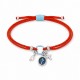 Bracelet avec pendentif en forme de croix et d'ovale sur cordon rouge