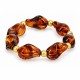 Pulsera con cuentas marrones irregulares y cuentas redondas de oro
