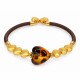 Braccialetto con Cuori Dorati e Color Miele su Cordoncino Marrone