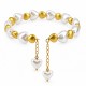 Bracciale con Cuori in Perla Bianca e Cuori Dorati