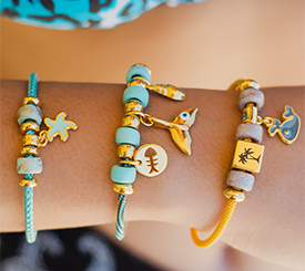 CORD BRACELETS W/ CHARMS