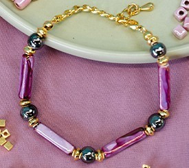 BRACELET W/ PURPLE TUBES