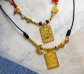 NECKLACES W/ GOLD TAGS