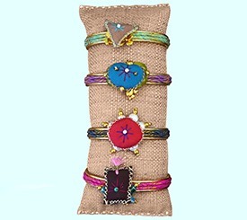 BRACELETS W/ TALISMANS