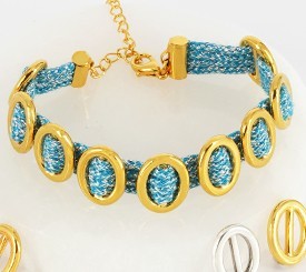 BRACELET W/ METAL OVALS