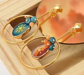 EARRINGS W/ SUN