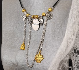 SPOOKY NECKLACE W/ CHARMS