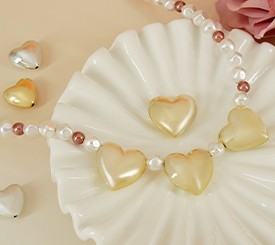 NECKLACE W/ GOLD HEARTS