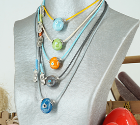 NECKLACES W/ CERAMIC EGGS