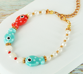 BRACELET W/ PEARLS & FISH