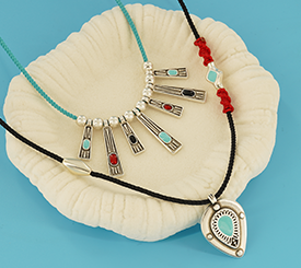 NECKLACES W/ ETHNIC CHARMS
