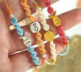 BRACELETS W/ FISH SLIDERS