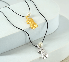 NECKLACES W/ CHARM STATUE