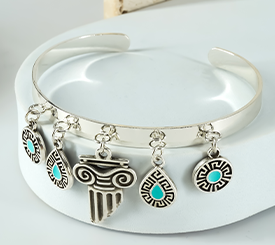 BRACELET W/ METAL CHARMS